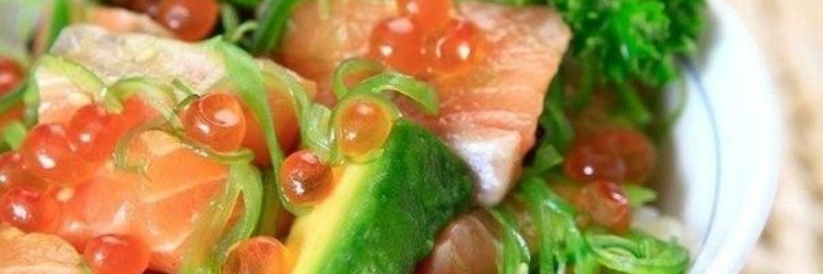 Salad with avocado, salmon and red caviar